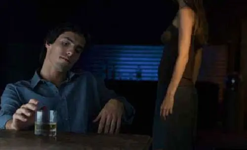 guy-sitting-at-bar