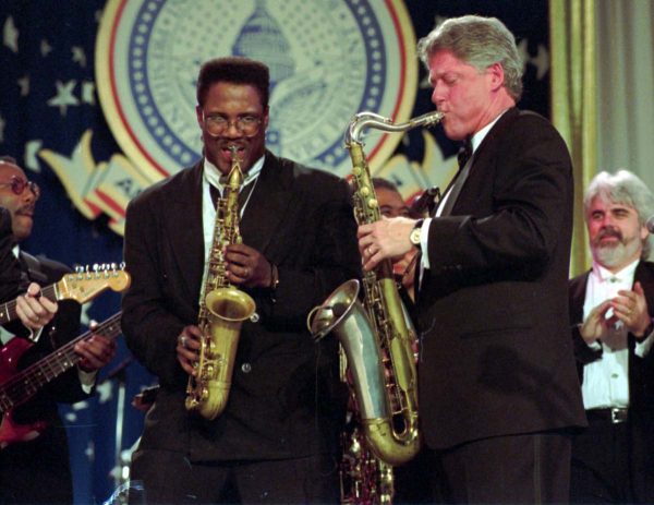 ADVANCE FOR WEEKEND EDITIONS, JAN. 15-16--FILE--President Clinton and Everett Harp play their saxophones during the Arkansas Ball on Inauguration evening at Washington's Convention center, Jan. 20, 1993. (AP Photo/Greg Gibson)