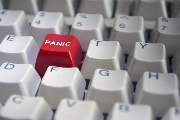 Computer keyboard with red panic button