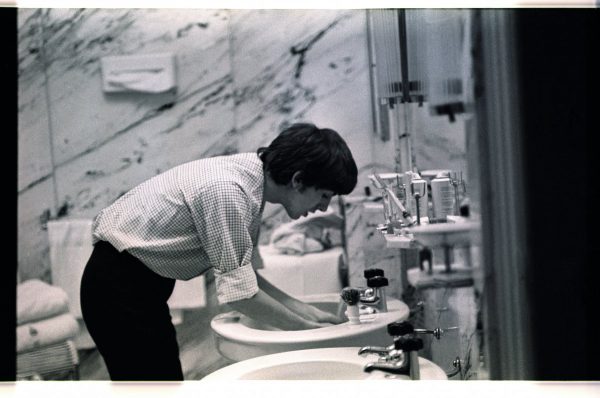 here-harrison-is-caught-cleaning-up-he-never-took-his-shirt-off-while-washing-his-hands-and-face--very-liverpool-says-starr