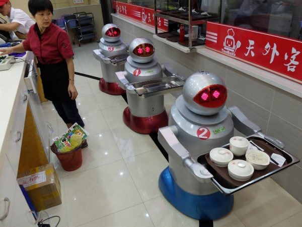Three-robots-behind-the-counter