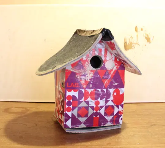 red-purple-skateboard-birdhouse