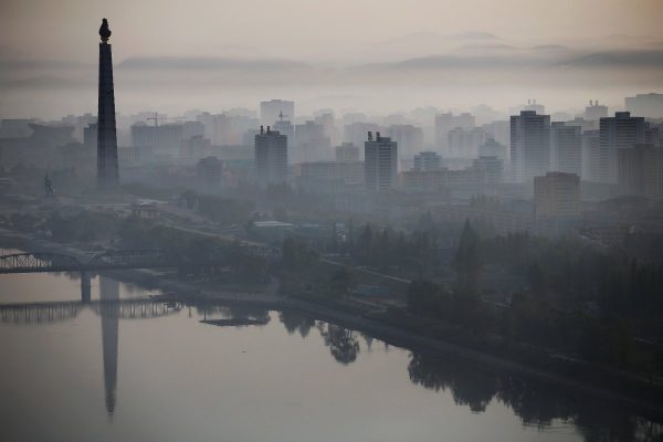on-the-other-side-of-the-city-the-558-feet-tall-juche-tower-looms-above-the-taedong-river