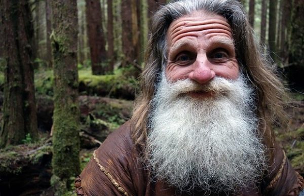 Location: Hoh Rainforest Olympic Peninsula Washington, USA: A smiling portrait of Mick Dodge, the legend himself, deep within the Hoh Rainforest. (Photo Credit: National Geographic Channels/Screaming Flea Productions/Brian Skope)