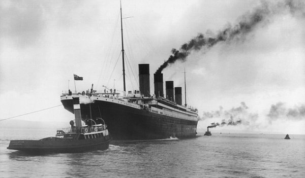 The White Star Liner RMS Titanic, built by Harland & Wolff in Belfast, 4th February 1912, aided by four tugs preparing to leave for Southampton for her maiden voyage to New York on April 10th 1912. The steamship sank on April 15th 1912 off the coast of New Foundland after striking an iceberg with the loss of 1,635 passengers and crew, (Photo: Universal Images Group/Getty Images)