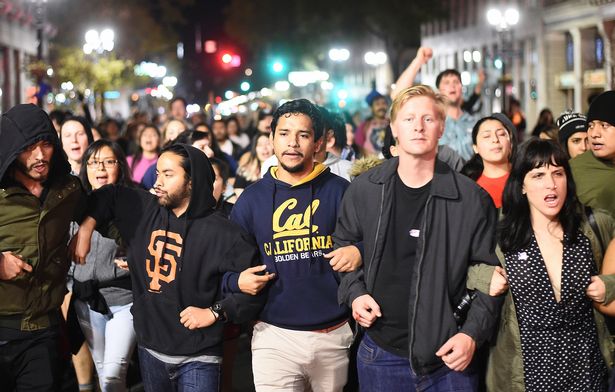 Protesters-against-president-elect-Donald-Trump-march-through-Oakland