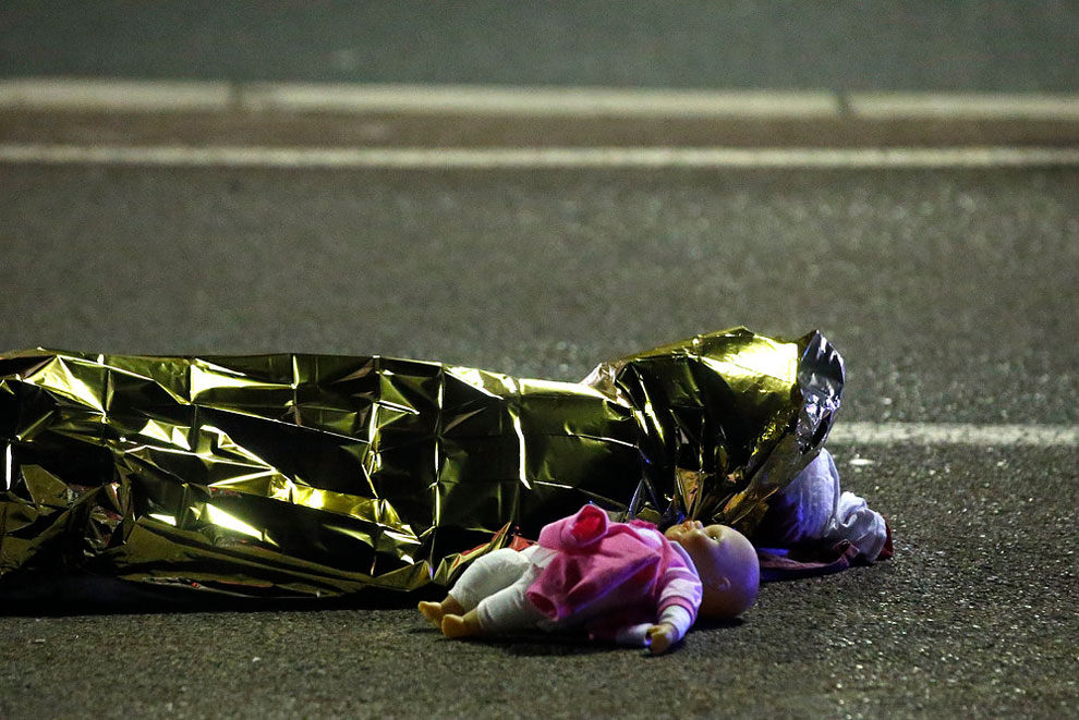 A body is seen on the ground July 15, 2016 after 86 people were killed in Nice, France,