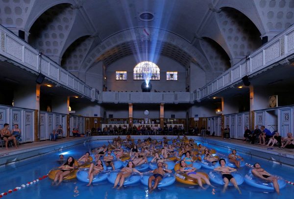 people-attend-the-screening-of-the-film-jaws-at-the-strasbourg-public-baths-during-the-european-fantastic-film-festival-in-strasbourg-france