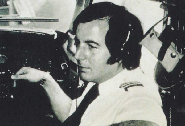 Frank Abagnale as pilot in cockpit of commercial airplane
