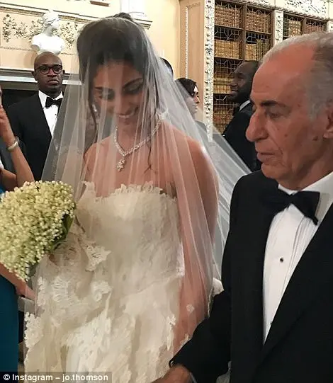 415C268E00000578-4595722-The_bride_was_seen_walking_down_the_aisle_on_the_arm_of_her_fath-a-65_1497268565627
