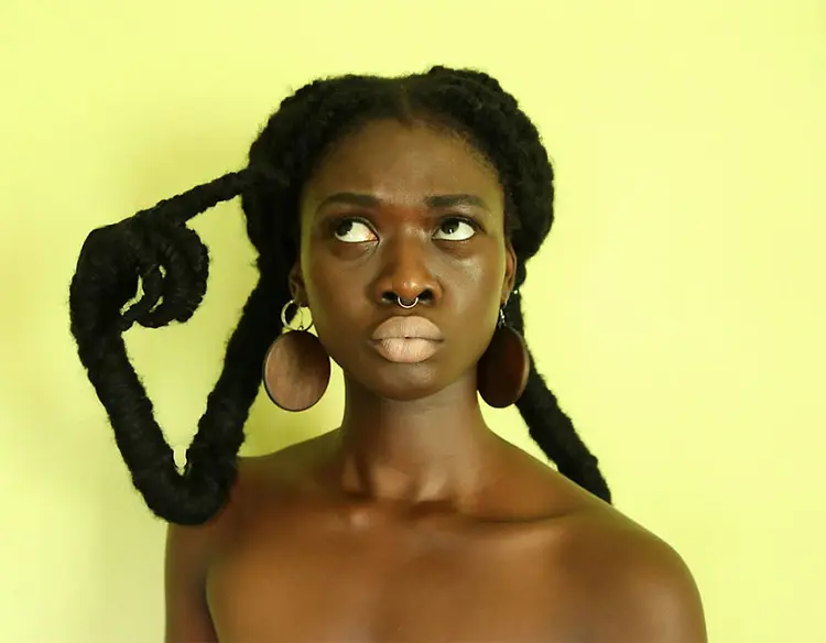 The-Ivorian-artist-sculpts-his-hair-to-match-the-expressions-in-his-mind-593edcc2dc99f__880