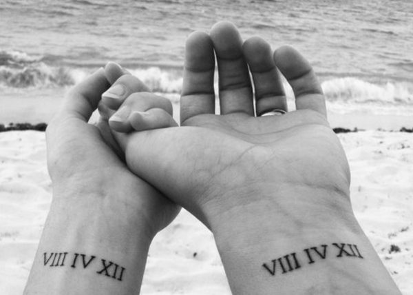 heres-another-couple-who-kept-rings-and-got-inked-with-roman-numerals-this-time-on-their-inner-wrists
