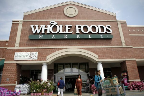In this May 3, 2011 photo, shoppers depart a Whole Foods Market store location in Providence, R.I. Whole Foods Market Inc. reports quarterly financial earnings Wednesday, May 4, 2011, after the market close. (AP Photo/Steven Senne)
