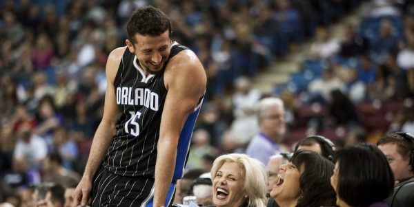 Magic's Turkoglu jokes with fans during their NBA basketball game against the Kings in Sacramento