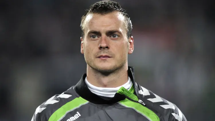 Lithuanian Zydrunas Karcemarskas listens