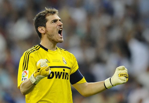 Real Madrid's goalkeeper Casillas celebrates his team's second goal against Barcelona during their Spanish Supercup first leg soccer match in Madrid